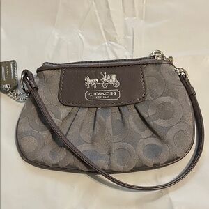 Coach carriage Signature Gray Wristlet w/silver hardware matching hangtag